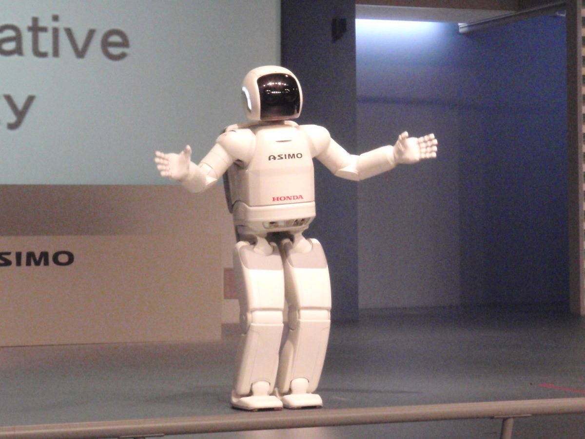 Honda's humanoid robot ASIMO performing on a stage